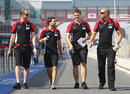 Jerome d'Ambrosio heads out to walk the track with his engineers