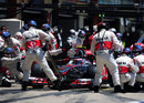 Jenson Button makes a pit stop for new tyres