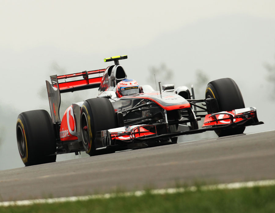 Jenson Button crests a brow in the McLaren