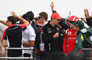 Jenson Button, Fernando Alonso and Jarno Trulli chat during the drivers' parade