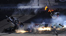 The car of Dan Wheldon (No. 77) flies in the air during a mass pile-up - he was seriously hurt and airlifted to hospital