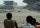 Neel Jani takes the Red Bull showcar around the track at the official unveiling of the new Buddh International Circuit