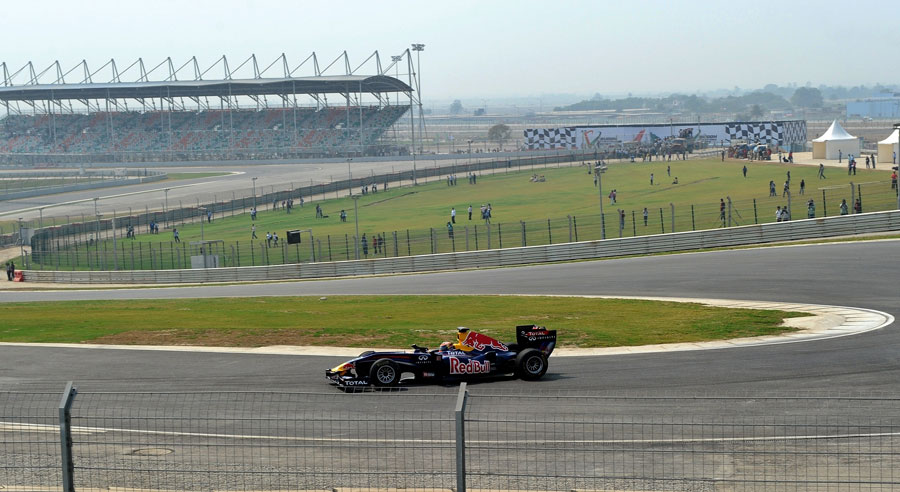 Neel Jani rounds turn three in the Red Bull showcar at the official unveiling of the new Buddh International Circuit