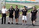 Bruno Senna walks the track with his race engineers