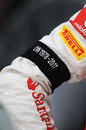 Jenson Button sports a black armband in memory of Dan Wheldon