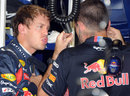 Sebastian Vettel talks to his race engineer Guillaume Rocquelin after practice