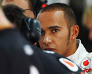 Lewis Hamilton talks to his engineers