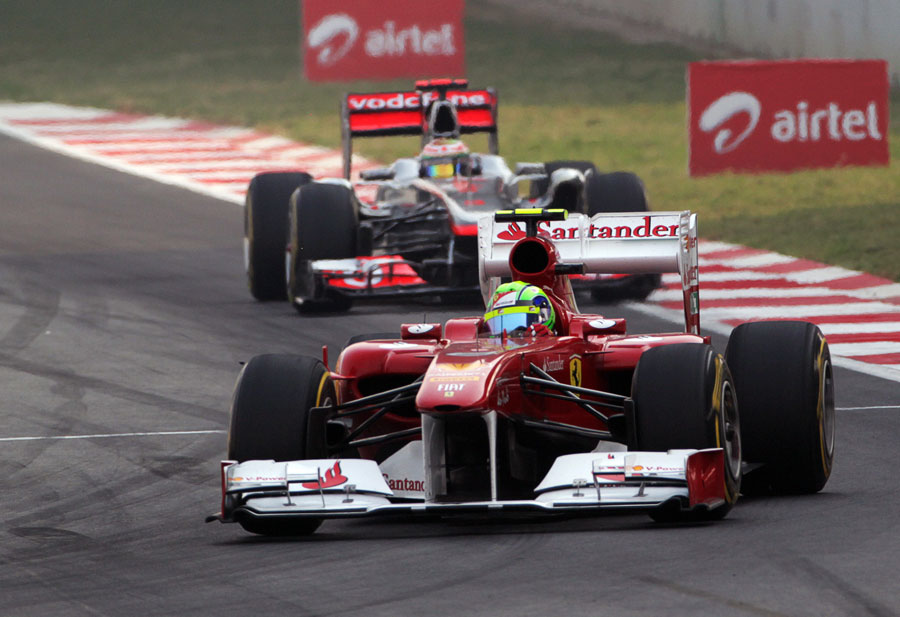 Felipe Massa leads Lewis Hamilton on the pit straight