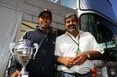 Karun Chandhok celebrates his victory with his father Vicky in the paddock