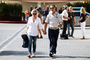 Michael Schumacher arrives at the circuit with his wife Corrina