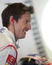 Jenson Button sporting a Movember moustache in the McLaren garage