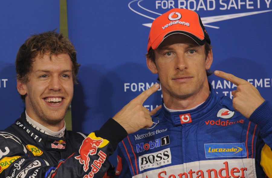 Sebastian Vettel points out Jenson Button's moustache