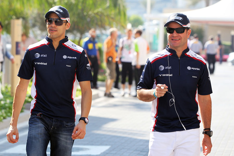 Pastor Maldonado and Rubens Barrichello in the paddock before the race
