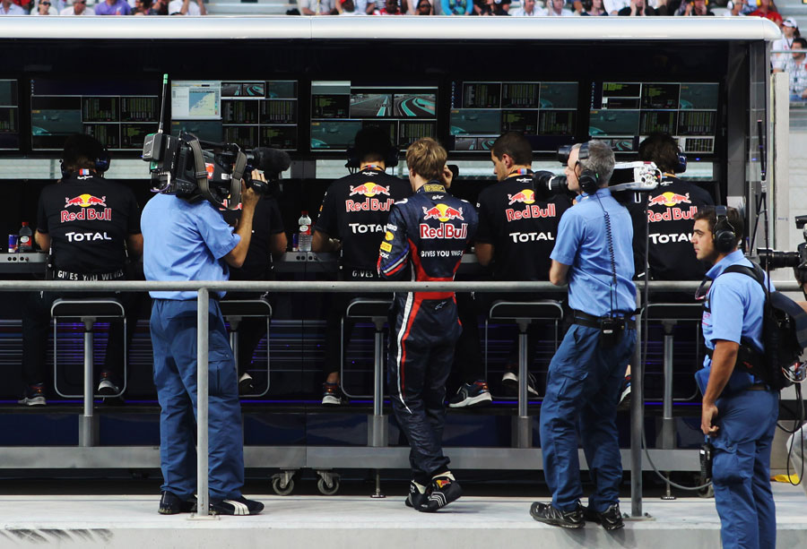 Sebastian Vettel on the Red Bull pitwall early in the race