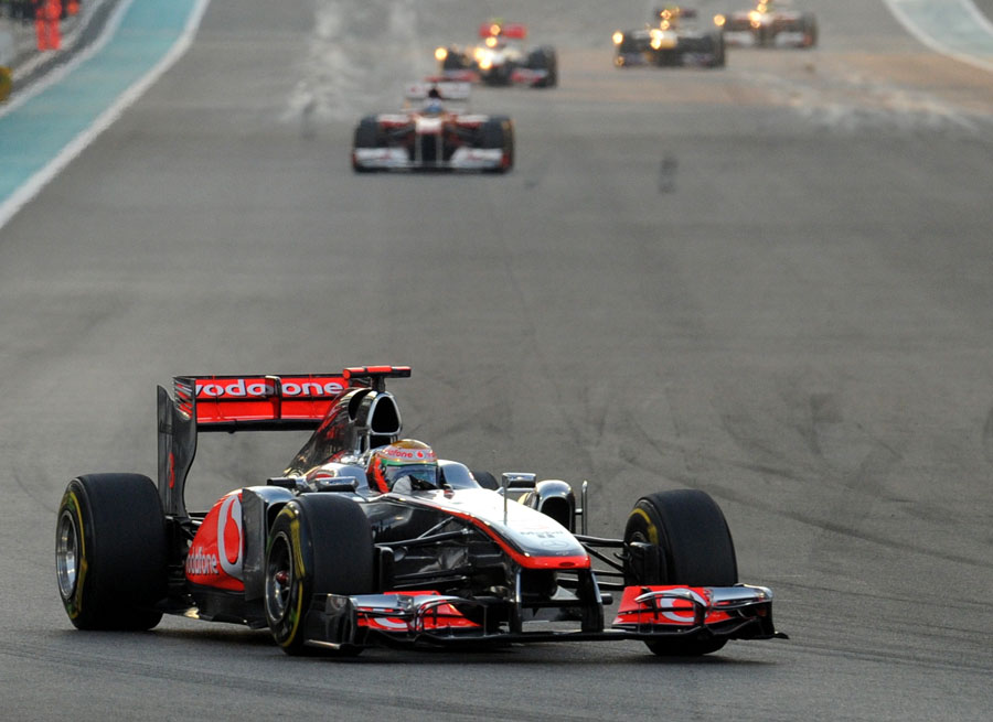 Lewis Hamilton leads early in the race