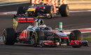Mark Webber closes in on Jenson Button early in the race