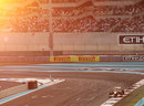 Felipe Massa exits the final corner as the sun sets