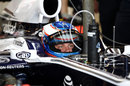 Valtteri Bottas waits in the Williams garage