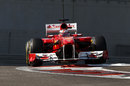 Jules Bianchi hops over the kerbs in the Ferrari