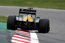 Heikki Kovalainen opens his DRS early and holds a slide