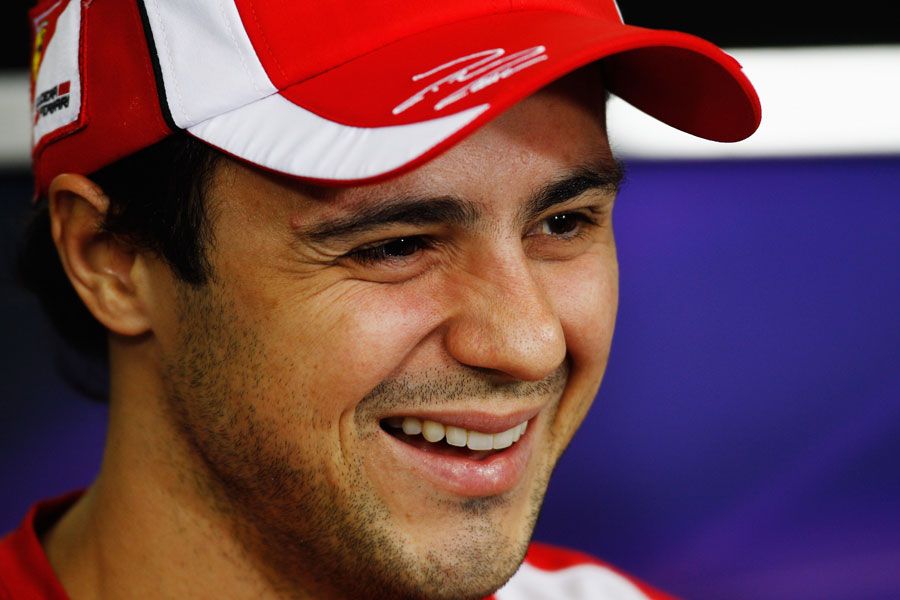Felipe Massa enjoys a joke in the driver press conference