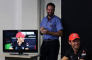 Jenson Button enjoys a joke during the driver press conference
