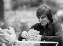 Brabham Team Owner Bernie Ecclestone play cards to decide whether a set of Texaco stickers should be placed on the Brabhams