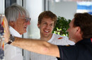 Bernie Ecclestone, Sebastian Vettel and Christian Horner chat in the paddock
