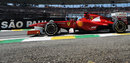 Fernando Alonso exits the pits on medium compound tyres
