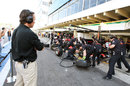 Sam Michael keeps an eye on a McLaren pit stop