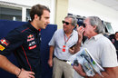 Jean-Eric Vergne chats to Jacques Laffite in the paddock ahead of his latest FP1 appearance