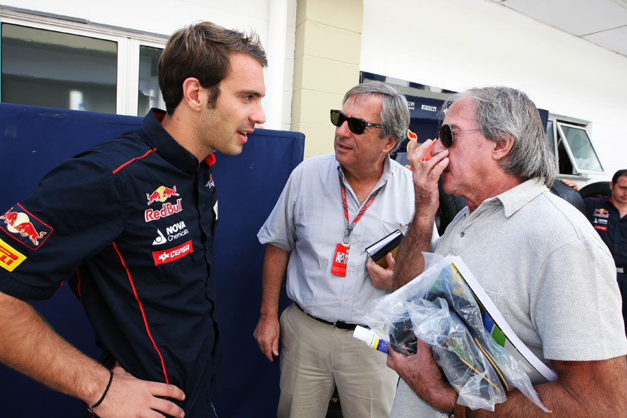 Jean-Eric Vergne chats to Jacques Laffite in the paddock ahead of his latest FP1 appearance