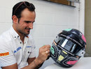 Tonio Liuzzi colours in his new helmet design for this weekend's race