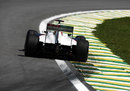 Kamui Kobayashi gets the power down in the Sauber