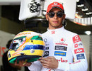 Lewis Hamilton shows off his special Ayrton Senna helmet design
