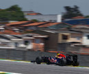 Sebastian Vettel uses every inch of the Interlagos circuit