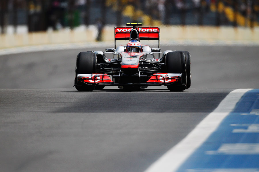 Jenson Button returns to the pits