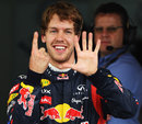 Sebastian Vettel celebrates his 15th pole position of the season