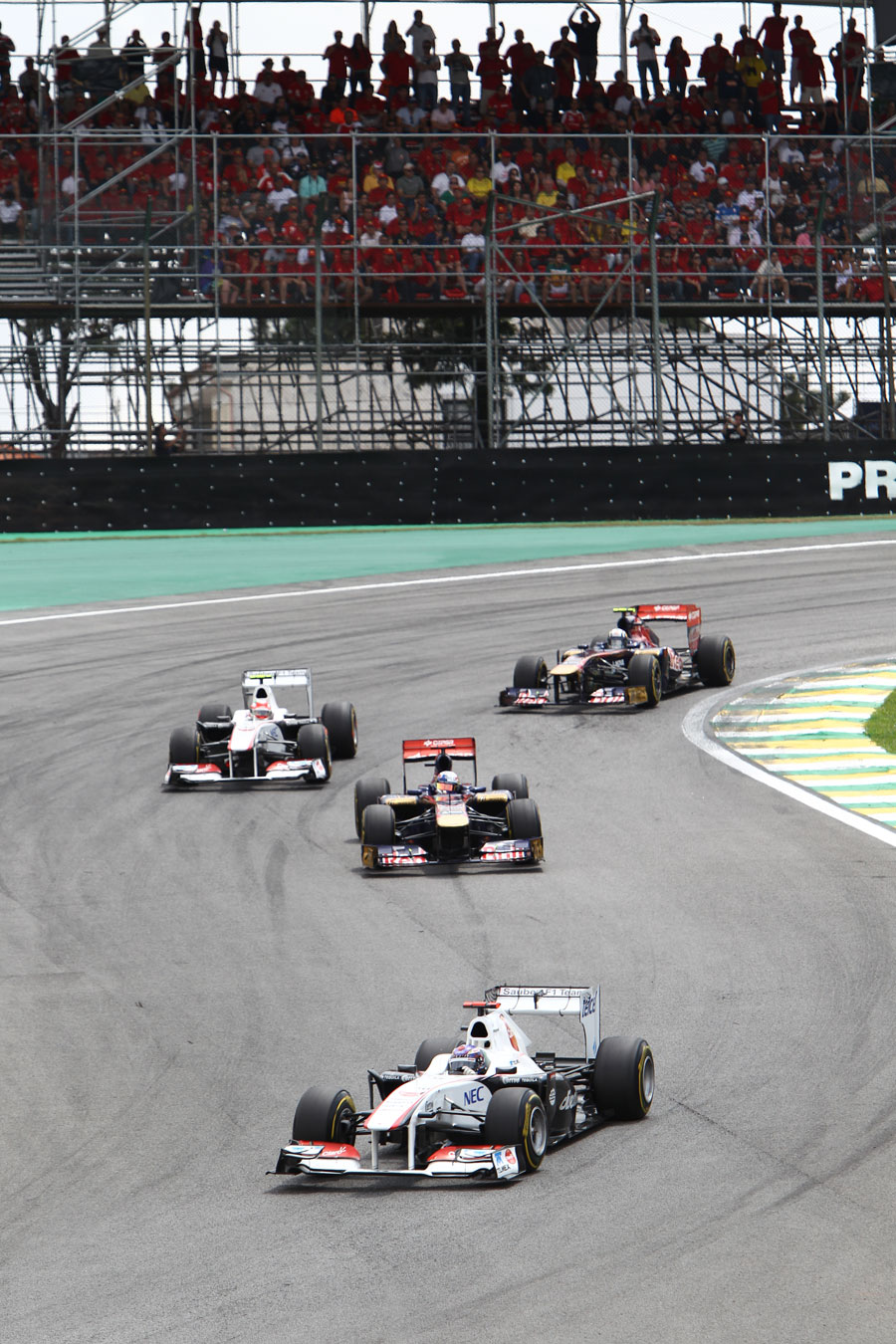 Kamui Kobayashi leads Jaime Alguersuari, Sergio Perez and Sebastien Buemi through the Senna S