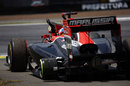 Timo Glock gets out of his three-wheel Virgin