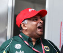 Tony Fernandes celebrates Lotus' tenth place in the constructors' championship