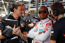Lewis Hamilton chats with race engineer Andy Latham before the race