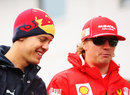 Sebastian Vettel and Kimi Raikkonen in the paddock