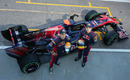 Sebastien Buemi and Jaime Alguersuari pose for a photo in the pit lane