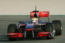 Lewis Hamilton takes to the wheel of the McLaren MP4/25 for the first time
