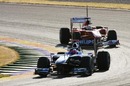 Rubens Barrichello leads Ferrari's Felipe Massa through the corner