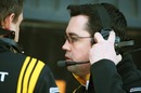 New Renault team boss Eric Boullier gets to grips with the communications during testing
