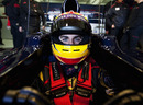 Jaime Alguersuari poses for a photo in his Toro Rosso cockpit