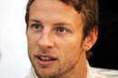 Jenson Button talks to the press after his first test as a McLaren driver