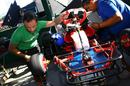 Tonio Liuzzi works on his kart at Felipe Massa's charity karting event